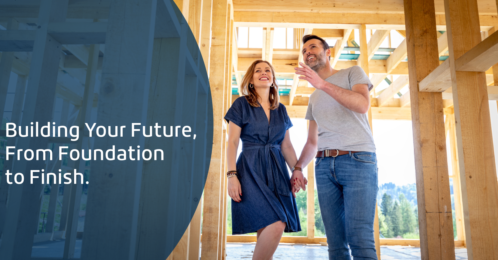 Family standing in front of their new home under construction